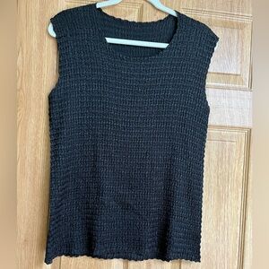 Black Sleeveless Textured Top. The textured part is a cute crinkly,material.